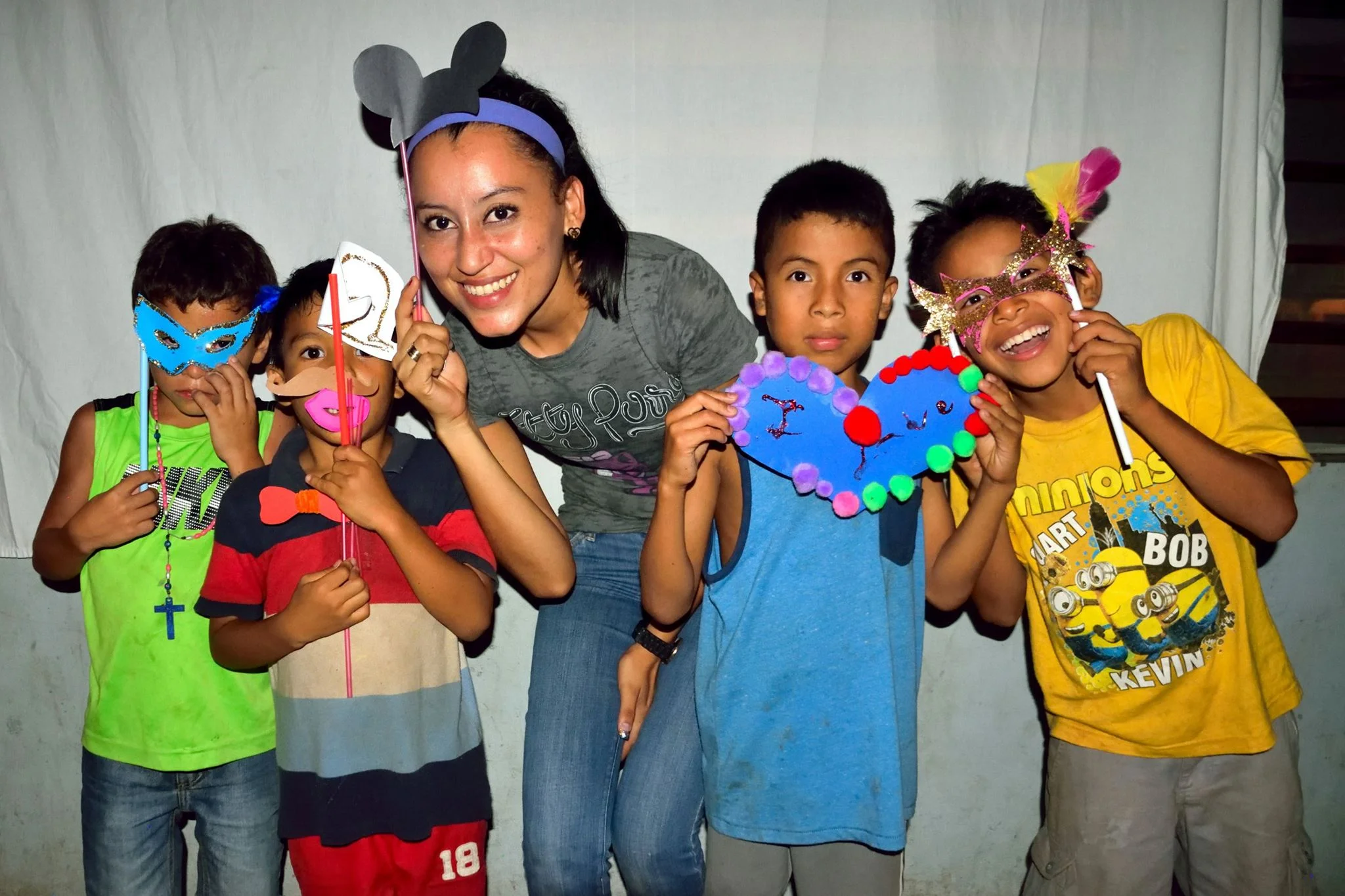 Matias (blue shirt) with his madrina (caretaker in his dorm) and friends
