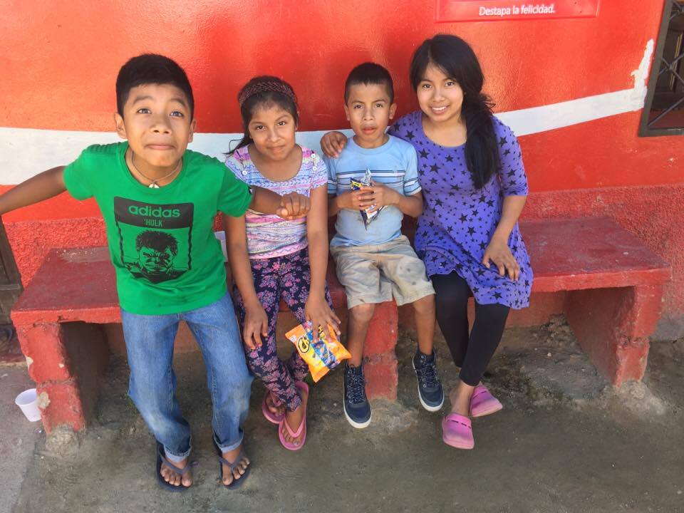 Matias (blue shirt) and his three older siblings who also live at Amigos