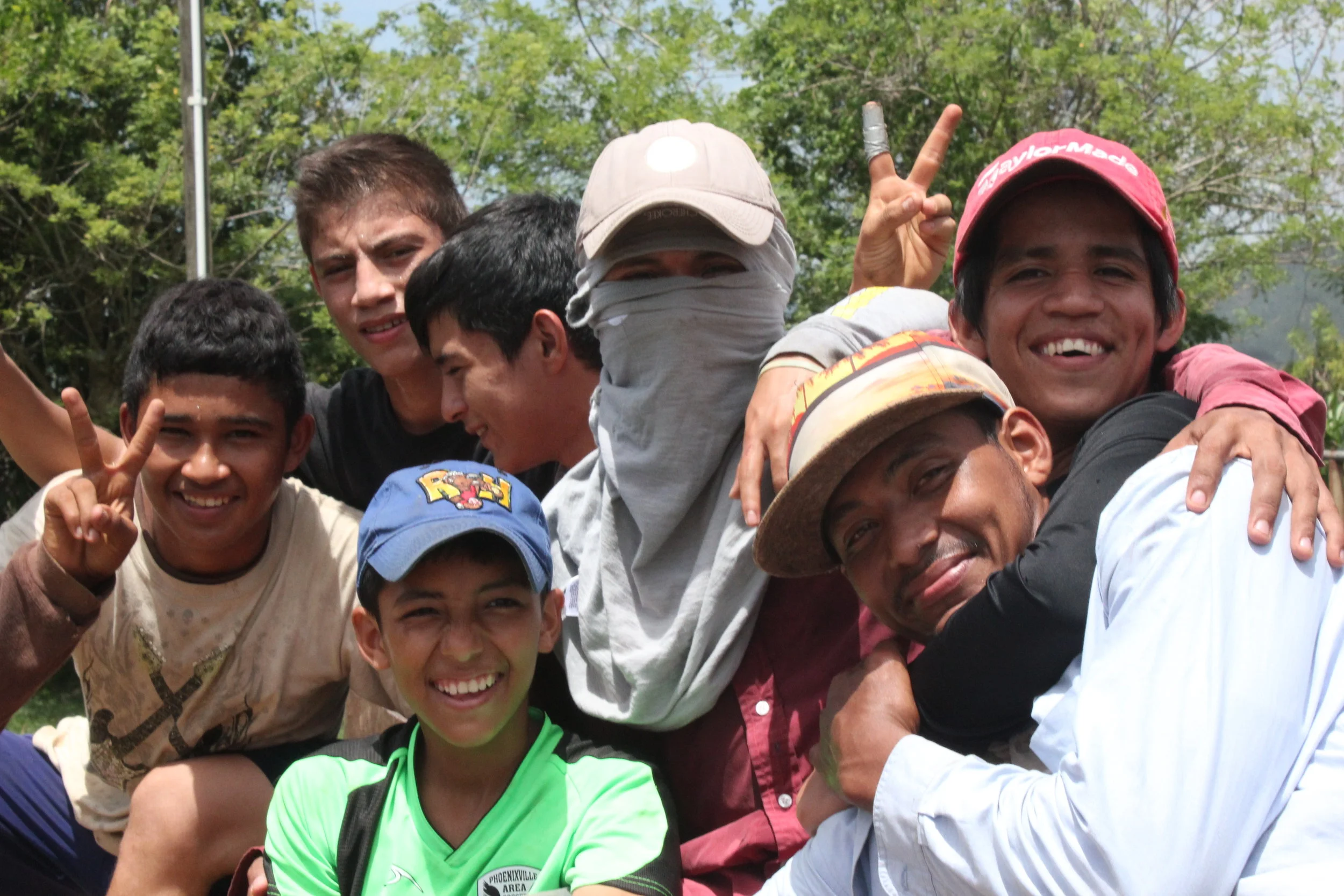 Adán (left) and his friends from 'agro.'
