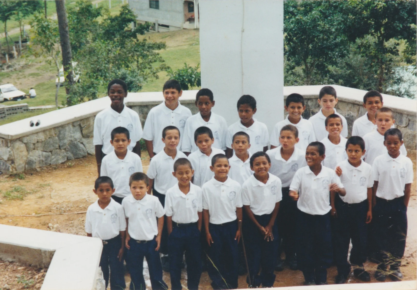 Martin pictured in the back row, all the way on the left in the early 2000's. 