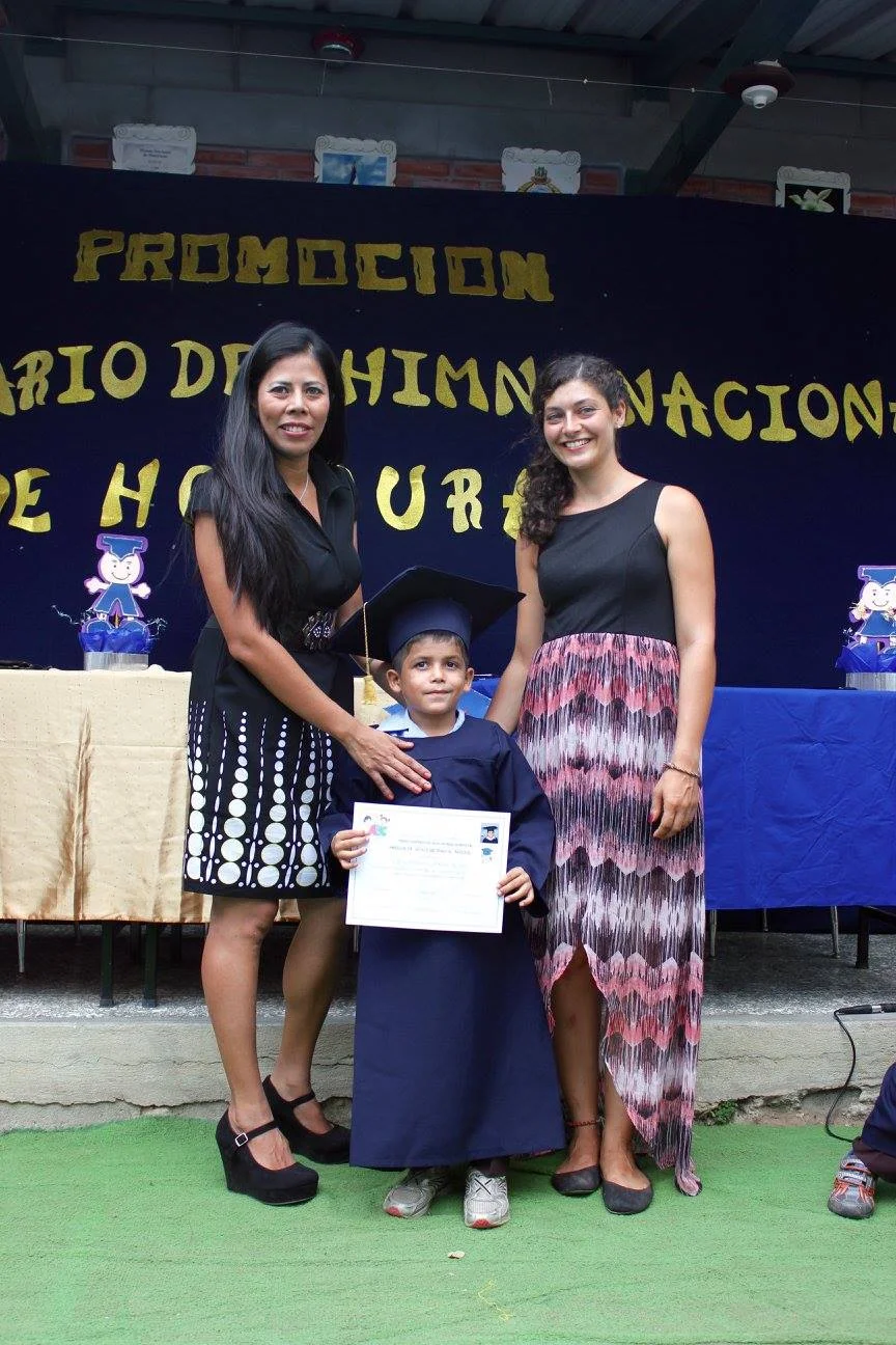 Fabian with his two teachers at his graduation from 'Prepa' (Kindergarten) in 2016.