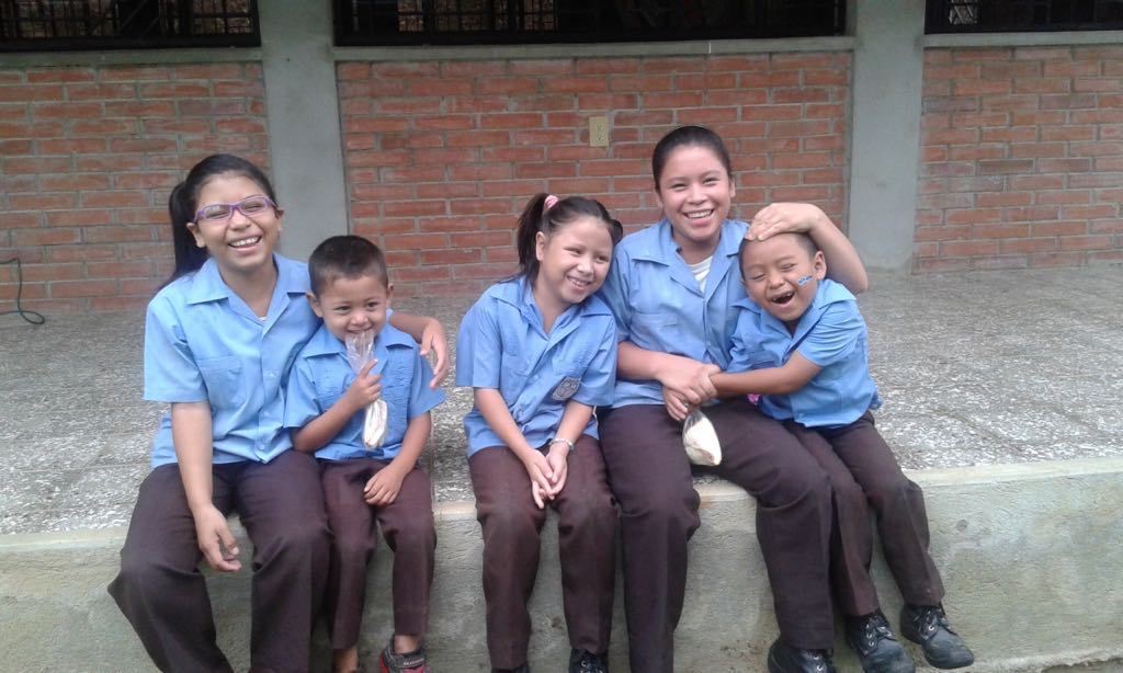 Agustin with his four siblings at school, 2016