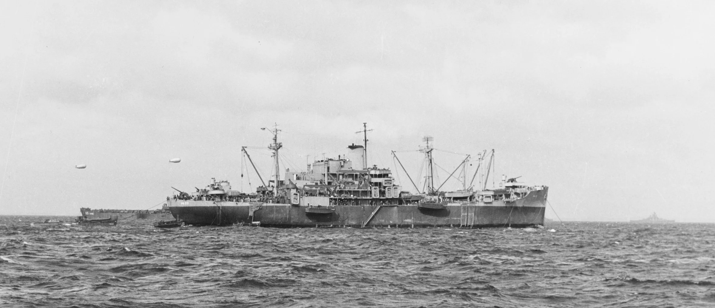 Book Figure 77. USS Bayfield, Flagship for Utah Beach invasion. USS Nevada visible in the distance on the right. US Navy NationalNaval Archives (Photo # 80-G-252377).
