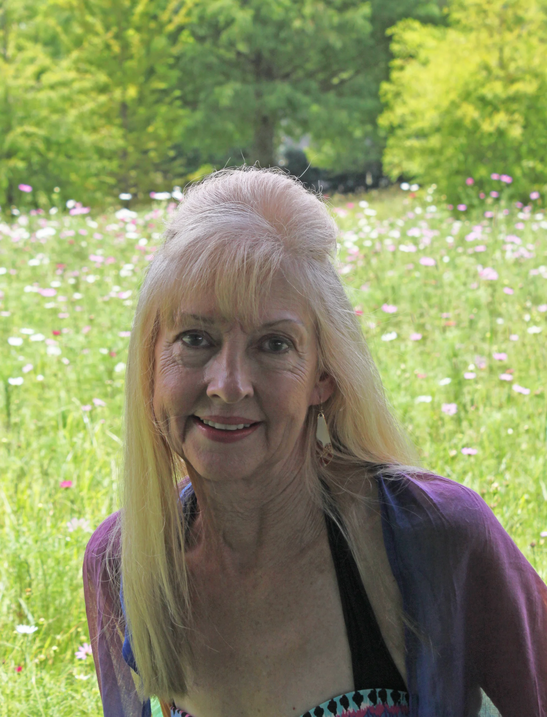 New Orleans Artist, Jeanne Umbdenstock , in N. O. City Park’s Wildflower Field