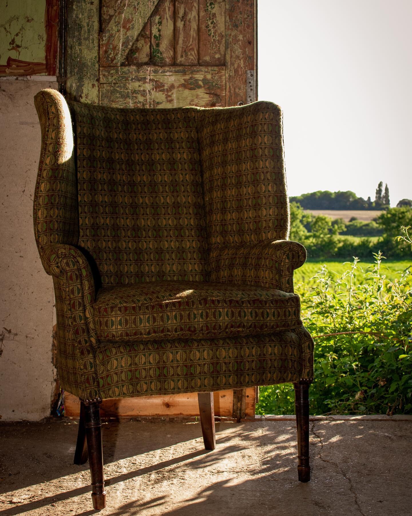 Georgian barrel-back wing chair upholstered in a Scottish wool. From the archives.