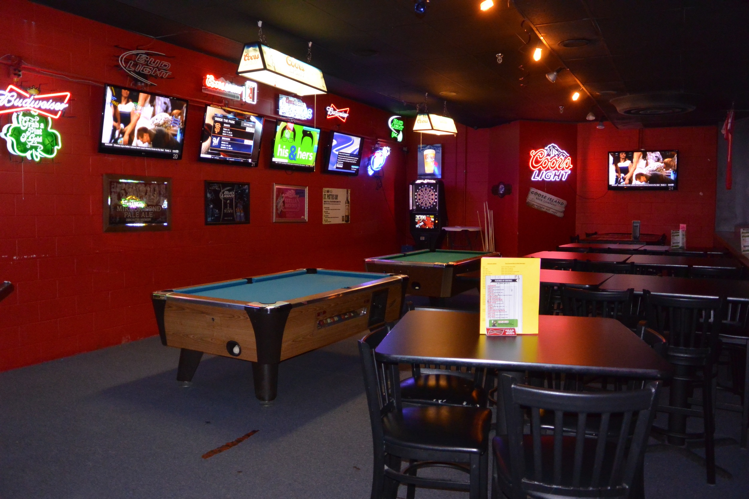 The Mezzanine Seats 42, with 2 Pool Tables, 1 Dart Board , and 5 Plasma TV's.