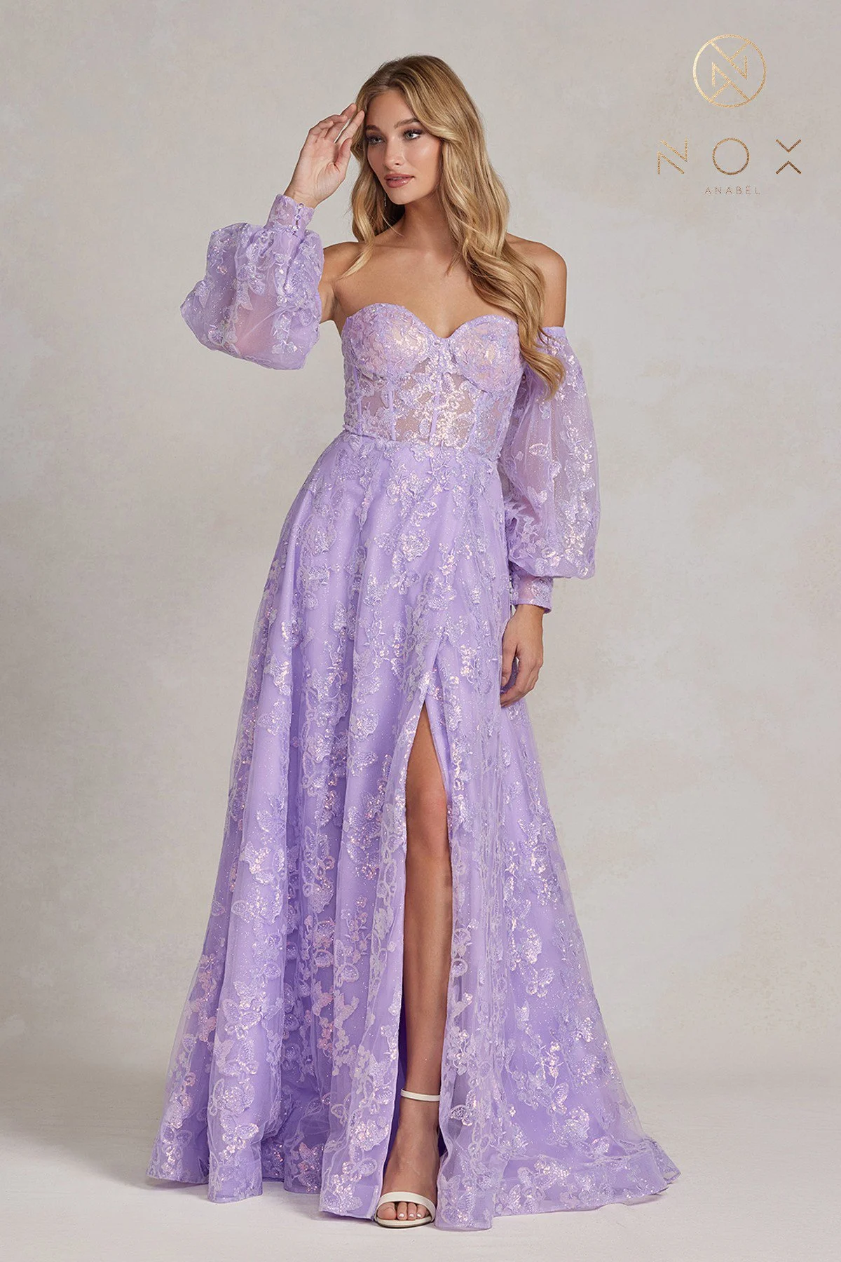 Explore the epitome of style with this dreamy lilac prom dress, offering classic sophistication and allure.