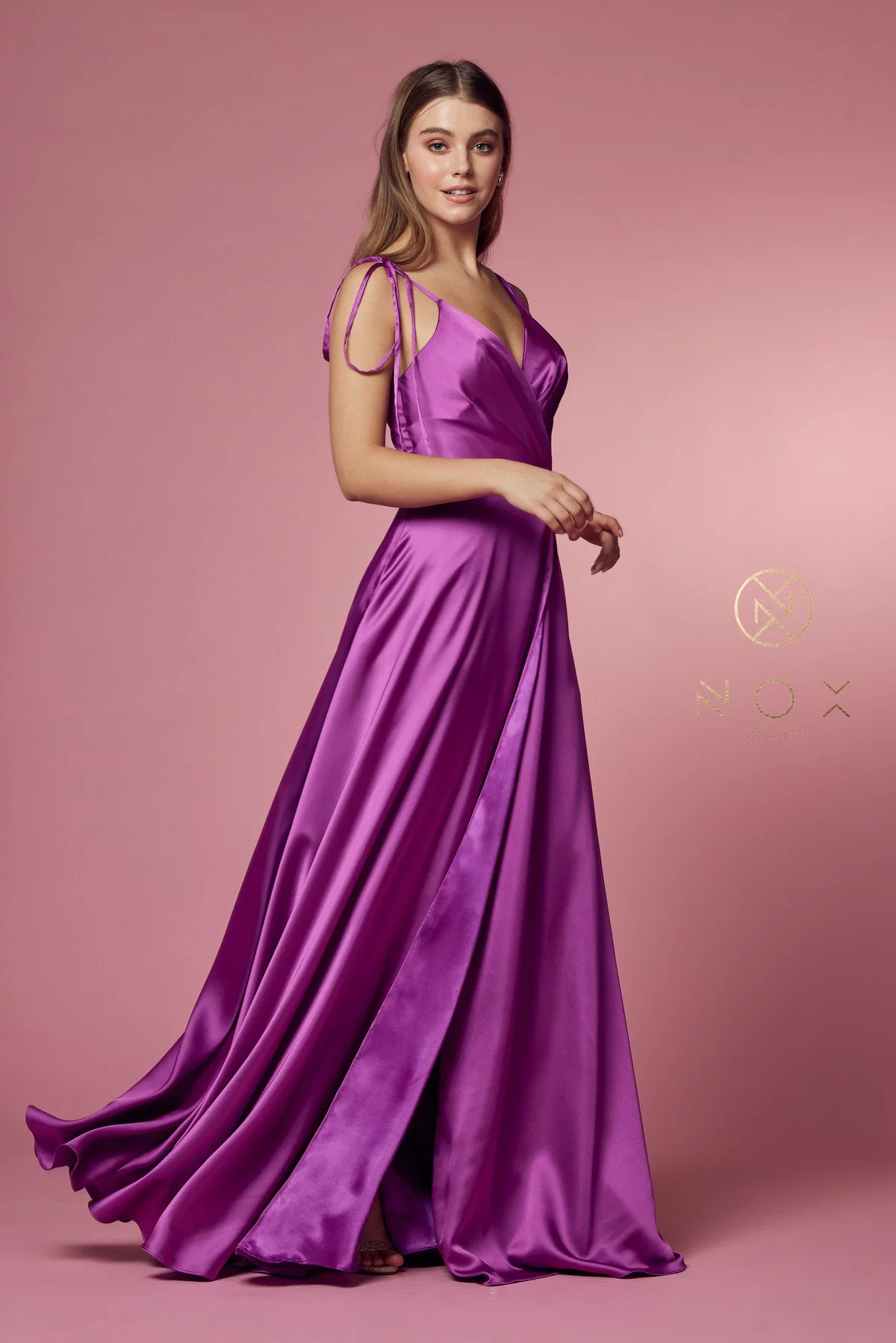 Make a statement in this captivating magenta prom dress, embodying timeless beauty and grace.