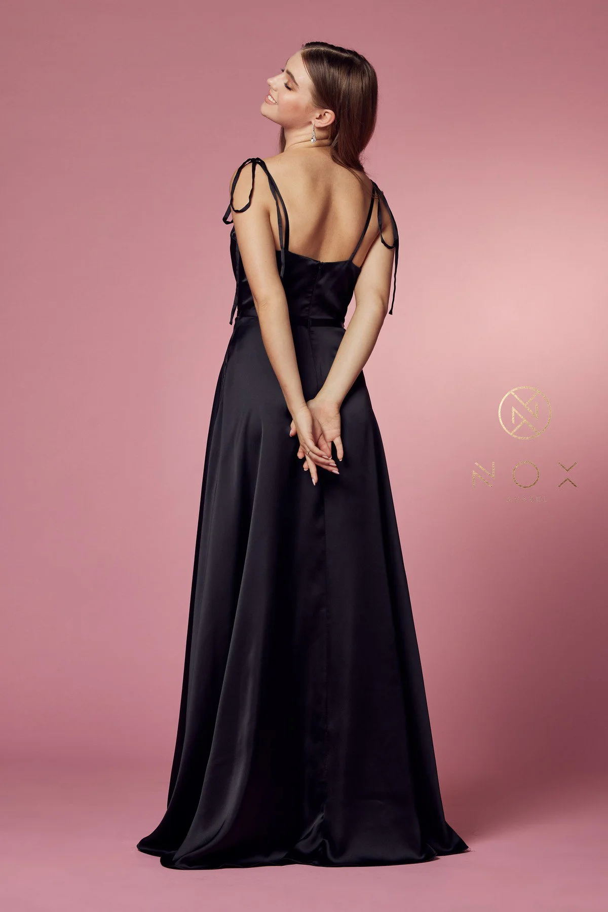 Make a statement in this captivating black prom dress, embodying timeless beauty and grace.