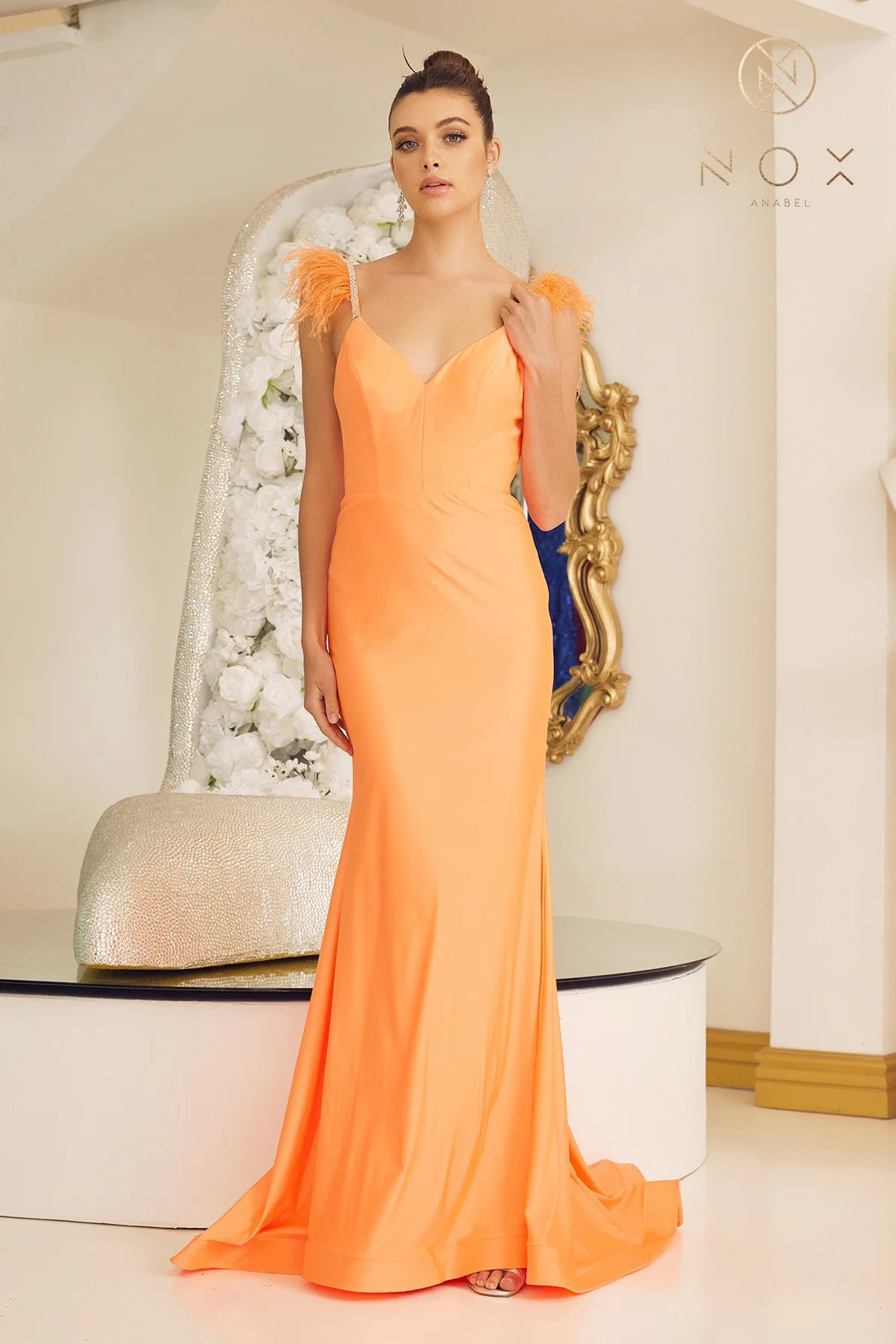 Make a statement in this captivating neon orange prom dress, embodying timeless beauty and grace.