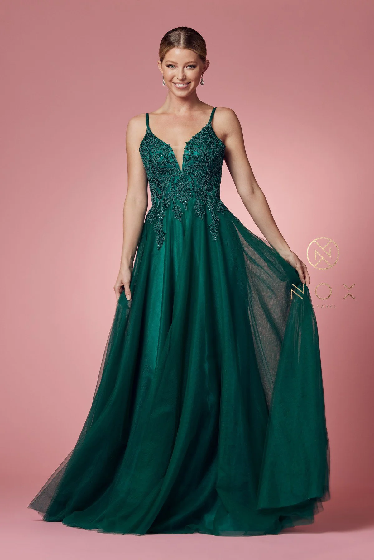 Step into the spotlight with this glamorous hunter green prom dress, radiating confidence and sophistication.