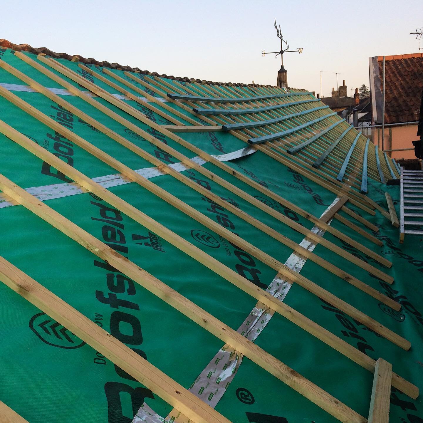 Re-roofing the office. Key importance is keeping the twisted form that has occurred over centuries of movement in the timber frame.