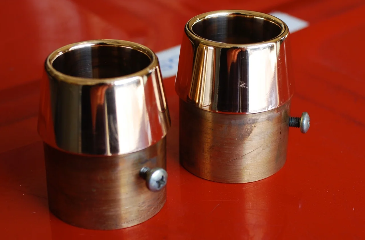  Brass exhaust tips for a Harley-Davidson. 