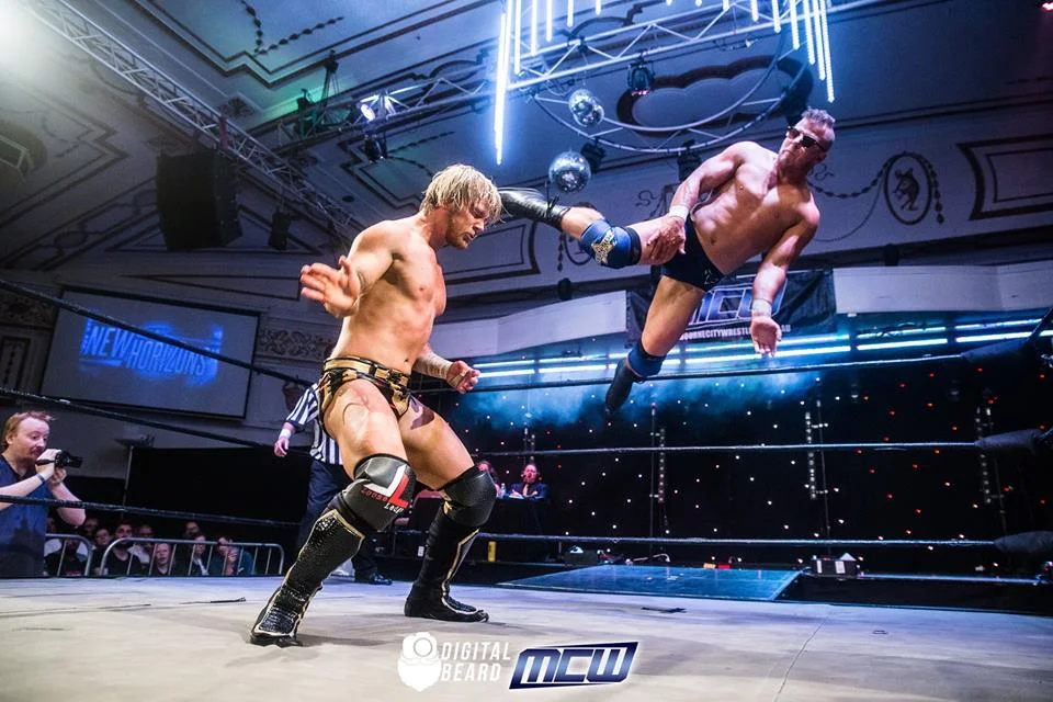 Slex with his sunnies. Adam Brooks gets a foot to his head. Picture credit: Digital Beard