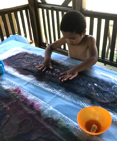 Caleb may be only four years old but he is a fiber artist at heart.
