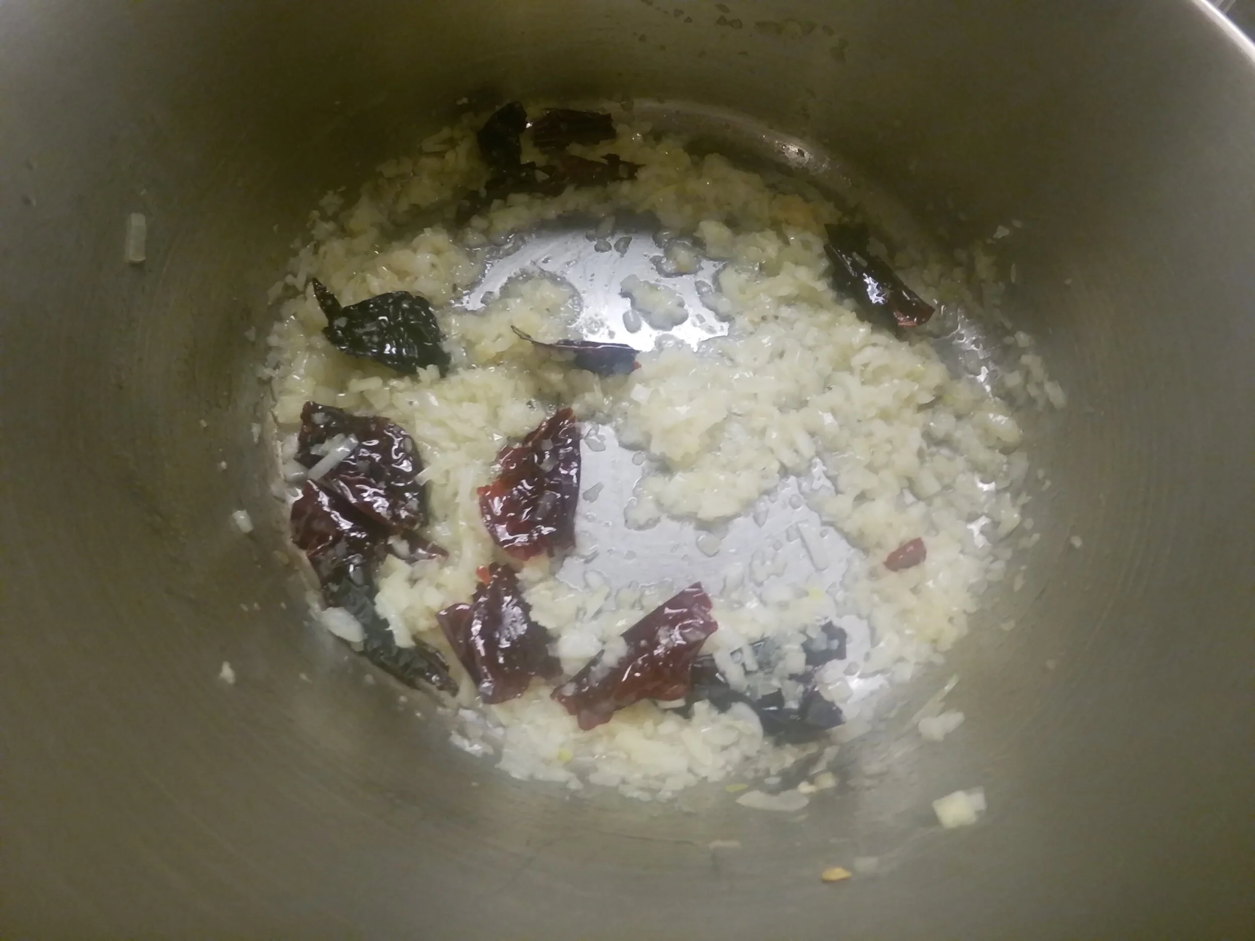 3. Cook onions and chiles until fragrant