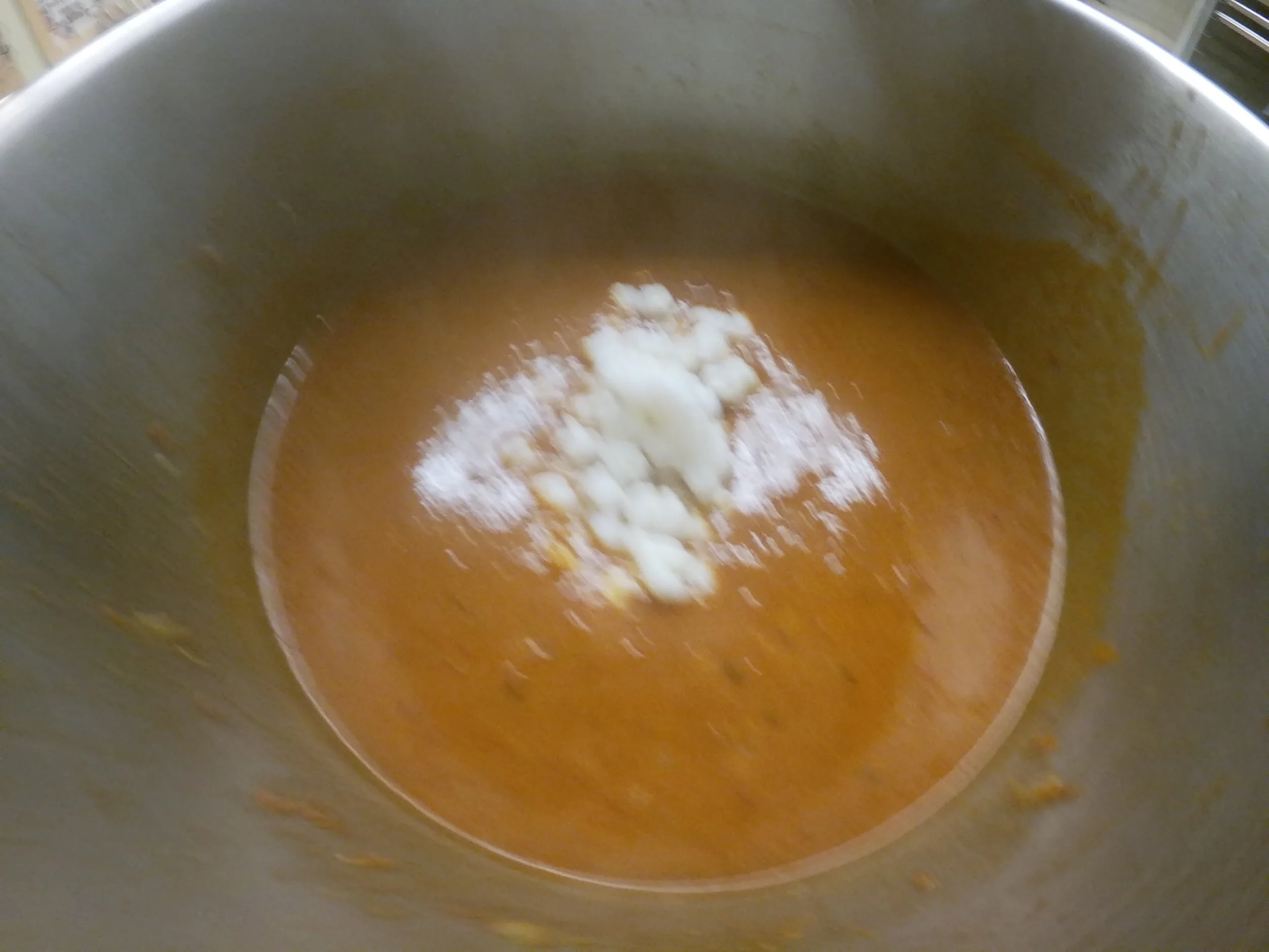 8. Add hominy, lime juice and season