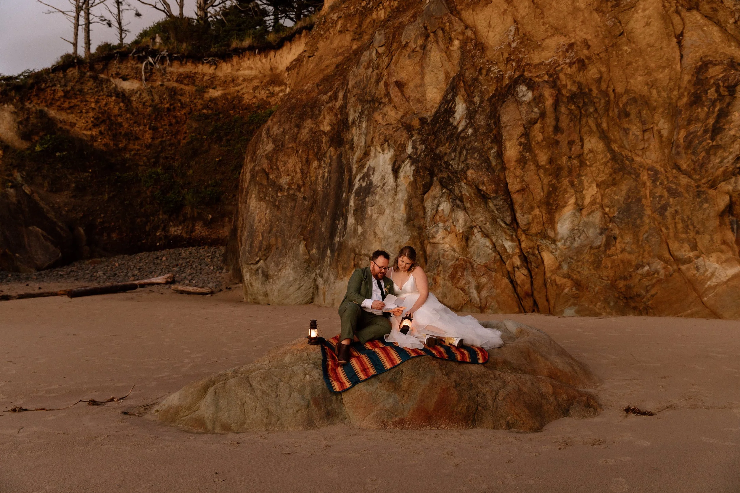 Couple reading family letters at their elopement day