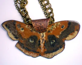 The Moth – Pendant Copper enamel on brass chains 2″x3.75″ on 24″ chain