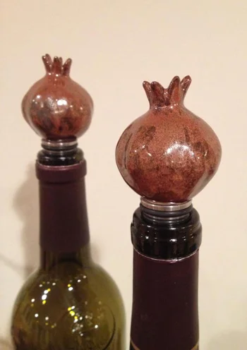 Pomegranate Bottle Stoppers Stoneware clay, each 3"x1"