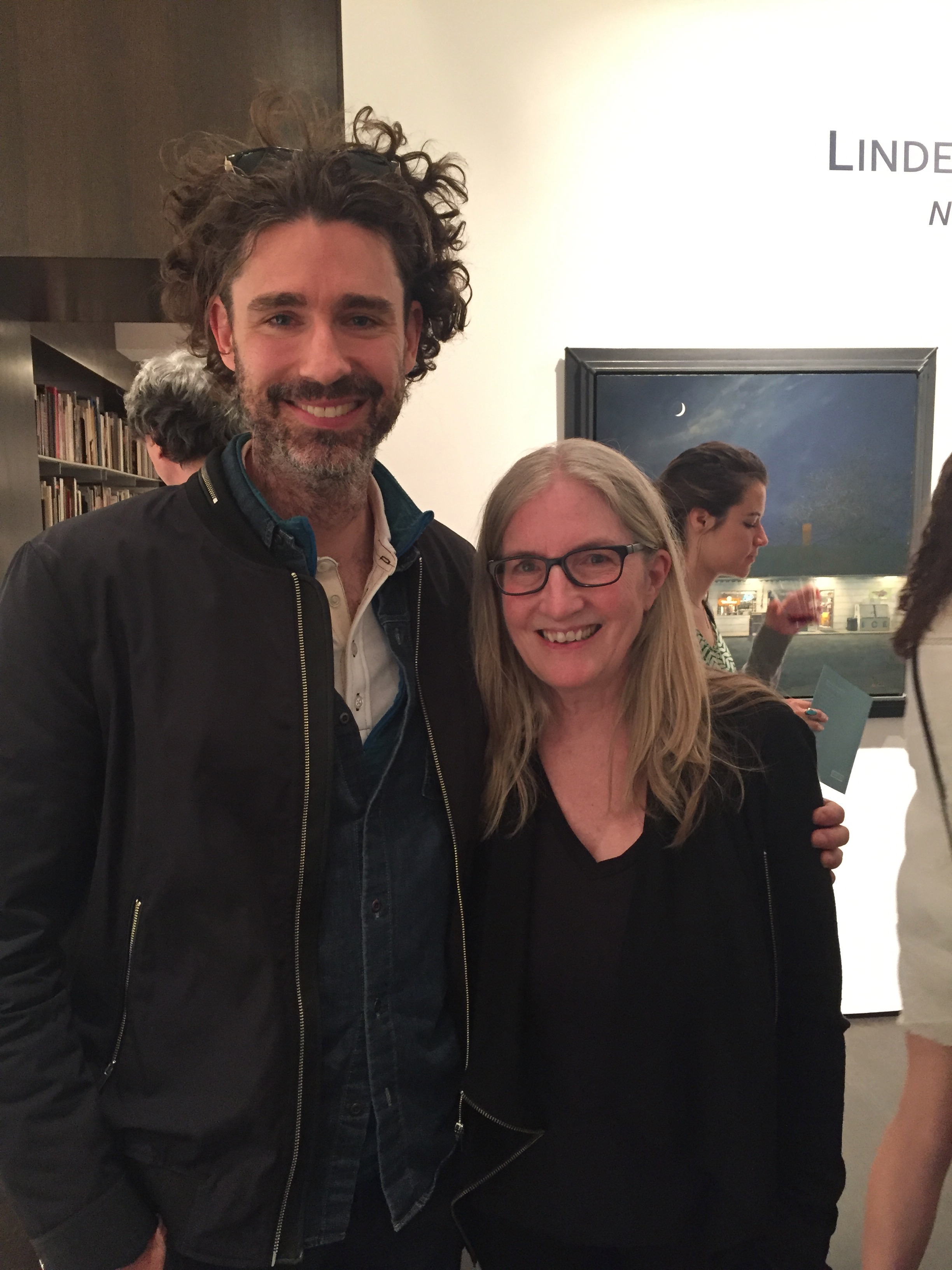 With Joshua Ferris, Linden's painting Police in the background, photo by Aimee Friedman