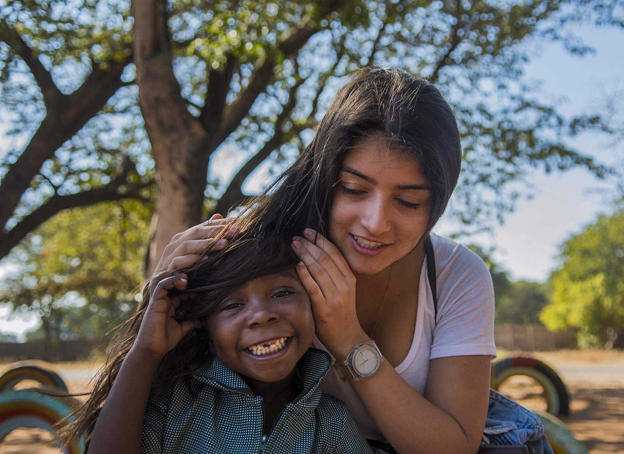  Elli Suarez is a volunteer for African Impact who has traveled all the way from Hawaii to Victoria Falls, Zimbabwe to be a part of their community project team that helps at the local old folks home, orphanage and schools. 