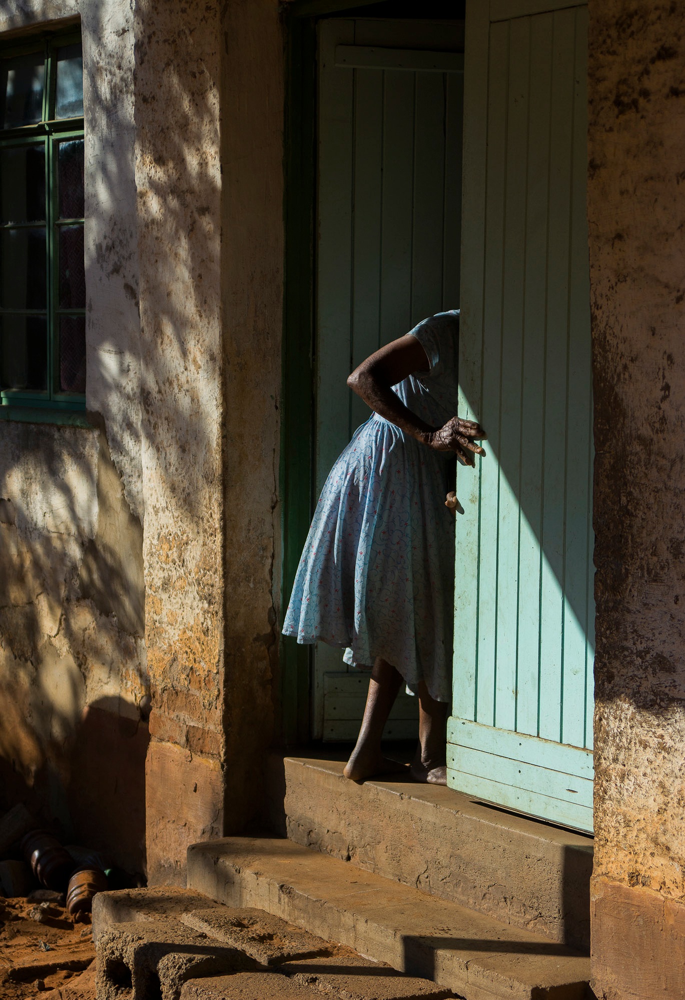  Elders at the local senior home have a hard time walking up and down the stairs outside their homes. Volunteers from African Impact will add onto the steps to turn them into gentle ramps to lessen their burden. 