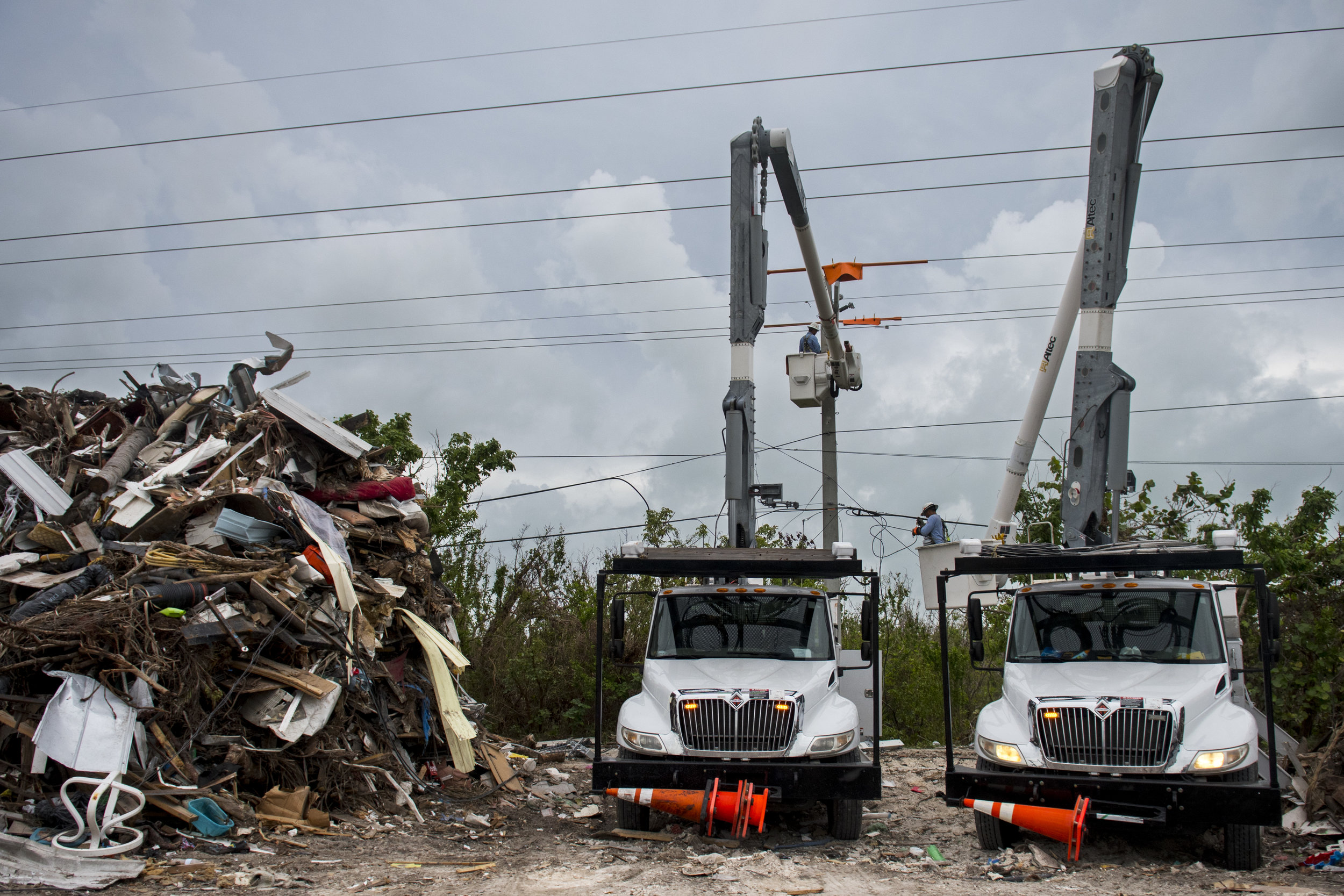  Over a month after Hurricane Irma made landfall multiple electric companies work around the clock to bring power back to the middle keys. Many lines were damaged during the hurricane and need to be repaired or replaced. 