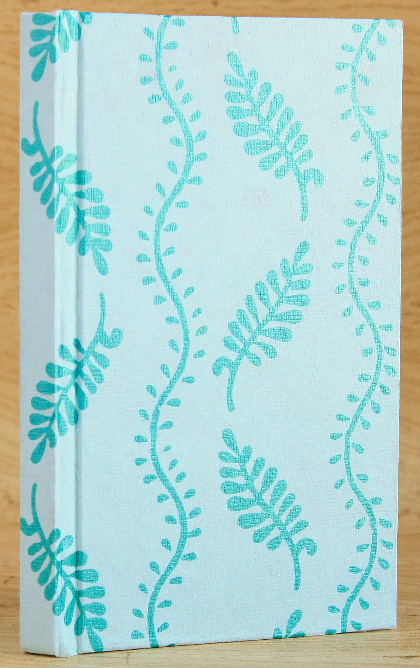 teal-leaf-print-journal-cased-in-front.jpg