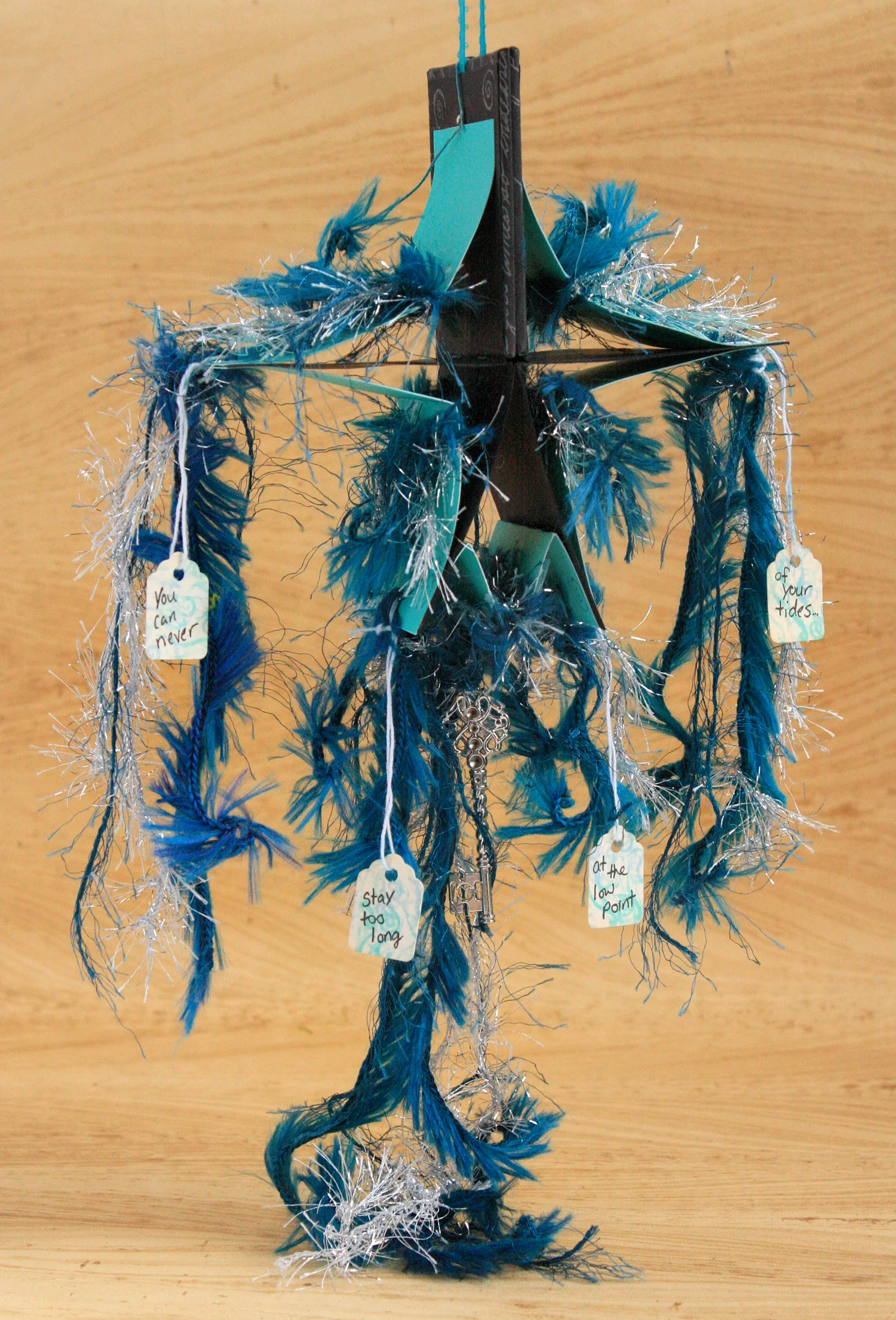 3x3-teal-star-open-hanging-with-text.jpg