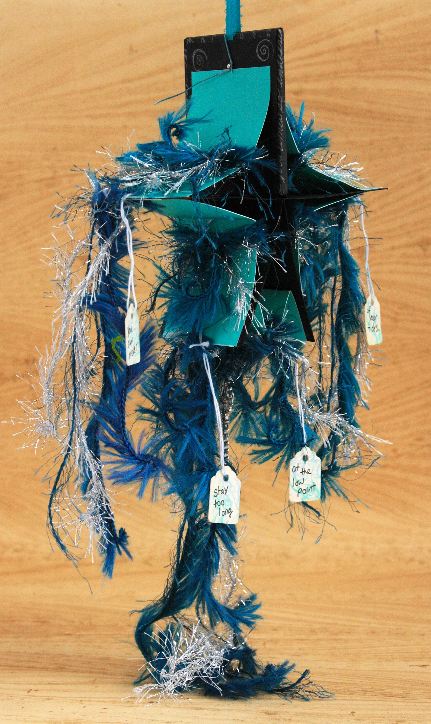 3x3-teal-star-open-hanging.jpg