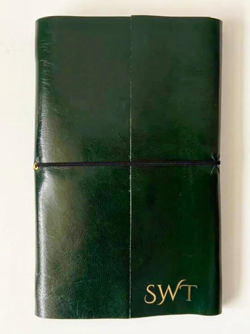 Our client needed an elegant gift for a very sophisticated leader in her organization. 

She told us she had been looking for a refillable personalized leather journal cover because her boss wrote pages and pages of notes every day and went through j