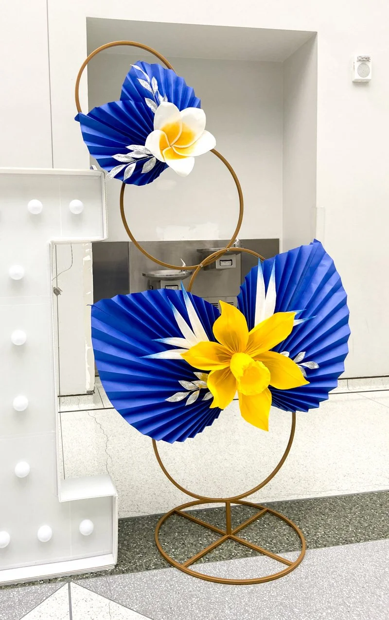 Gold standing hoop wreath with paper flowers
