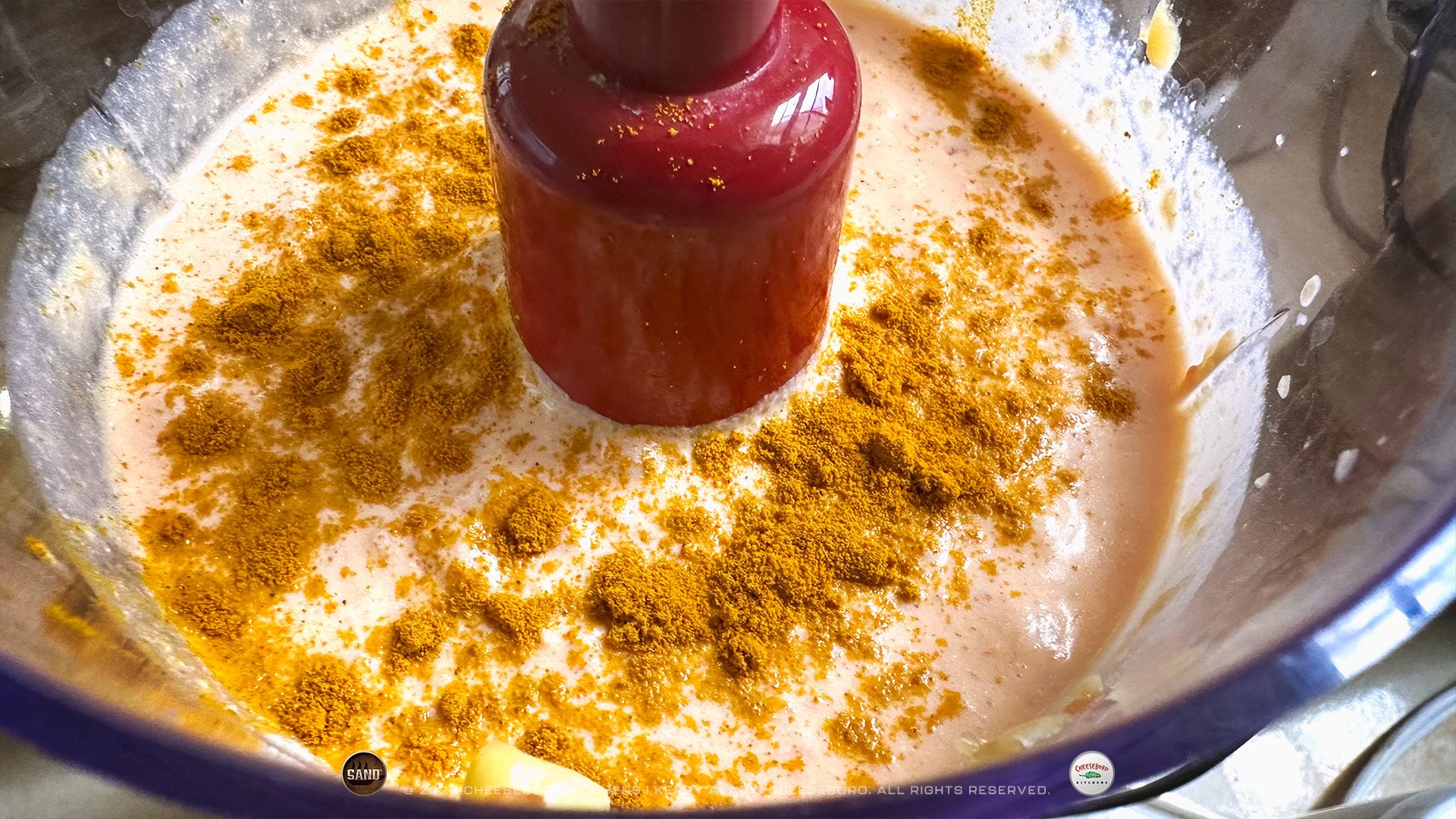 cheeskitch-230805-sand-garden-kerry-soup-adding-turmeric-1-1920-hor.jpg