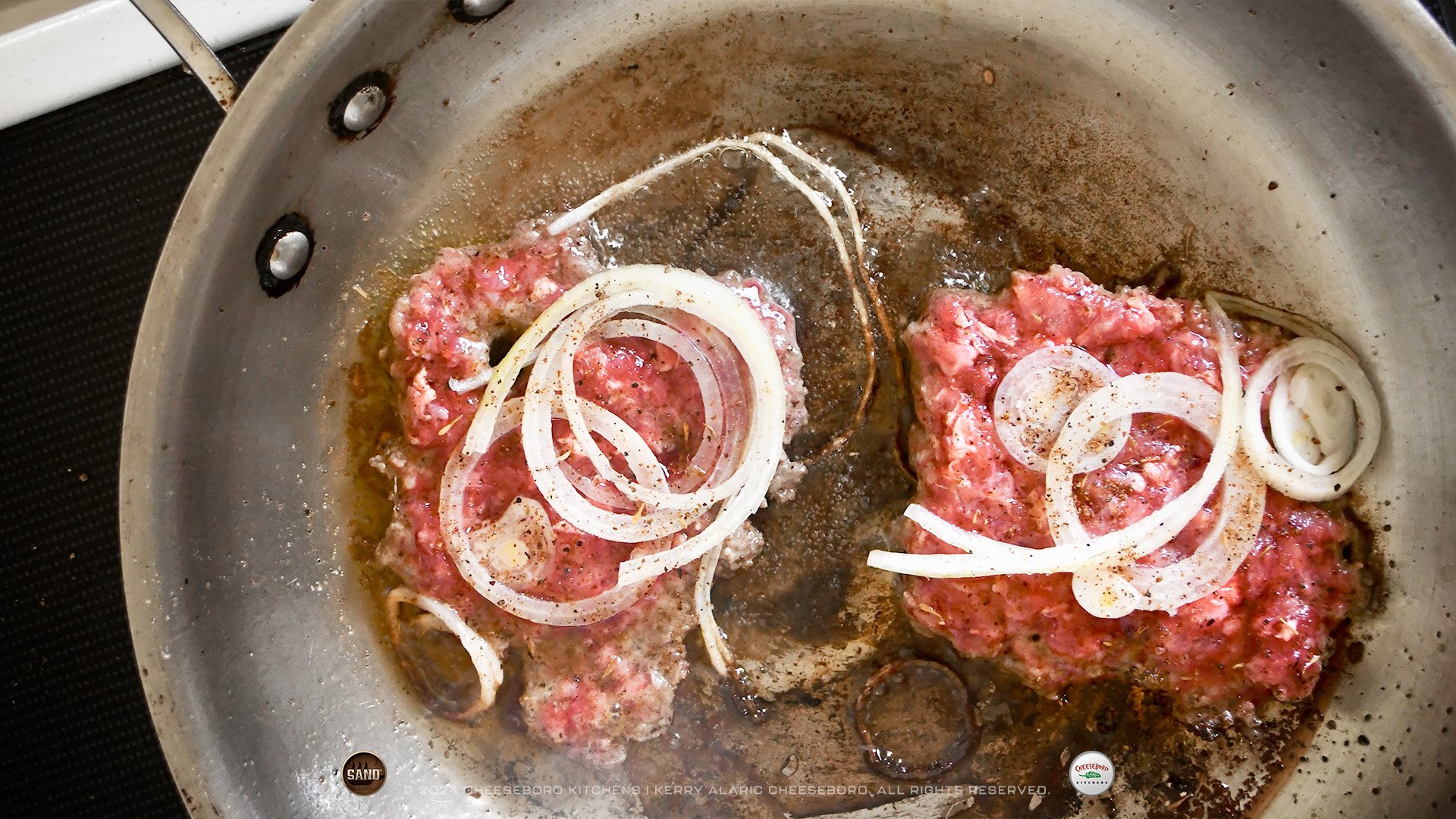 cheeskitch-240108-pop-sauce-usa-smash-burgers-in-pan-with-onions-beef-sand-1-1920-hor.jpg