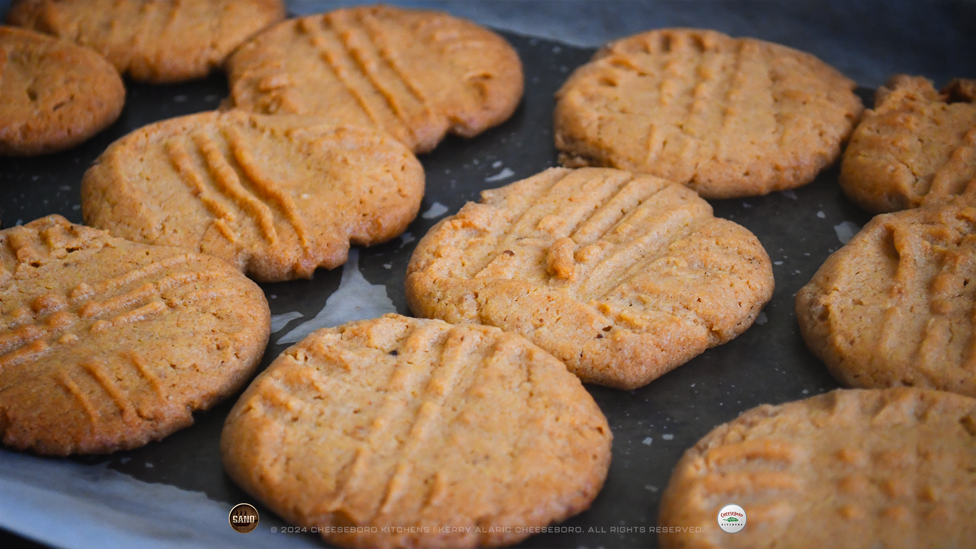 cheeskitch-240124-sand-sweet-spiced-iced-peanut-butter-cookies-baked-tray-1-1920-hor.png