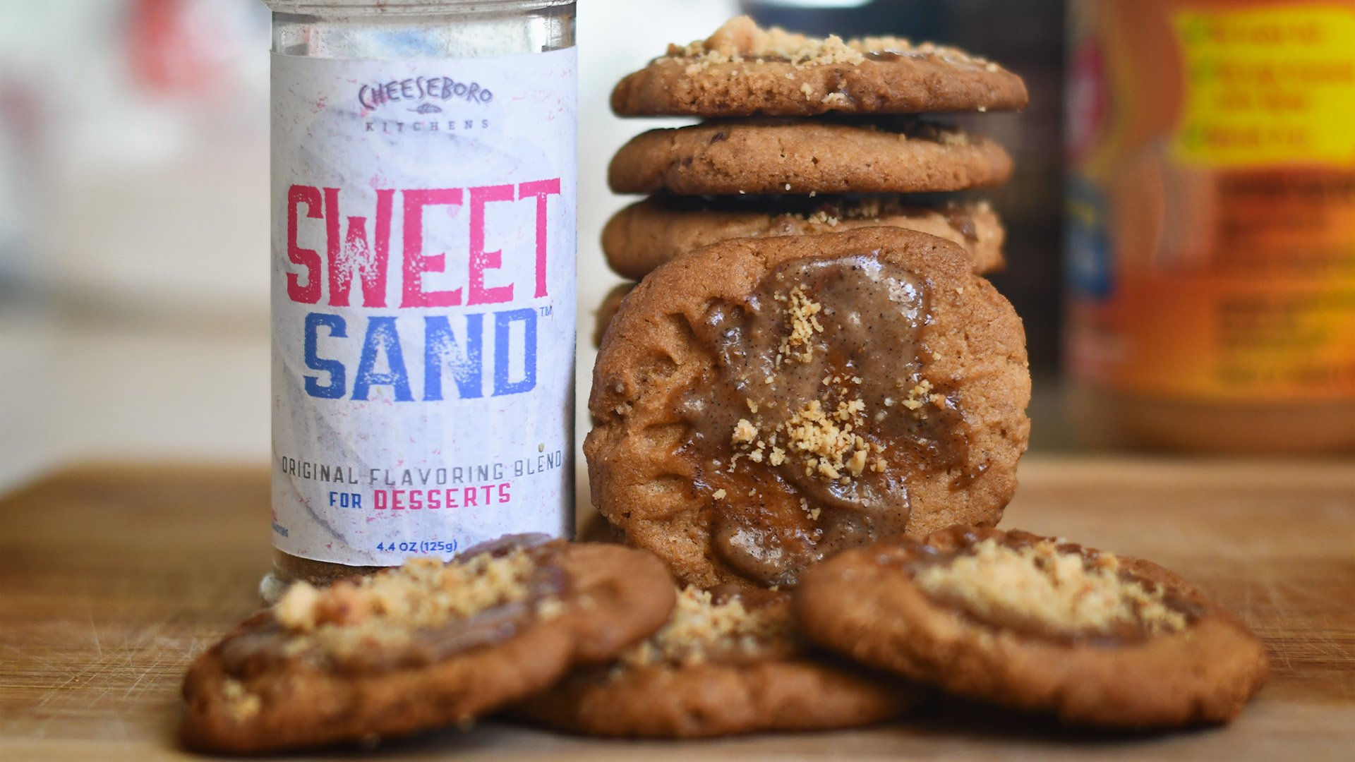cheeskitch-240124-sand-sweet-spiced-iced-peanut-butter-cookies-stacked-jar-1-1920-hor-meta.jpg