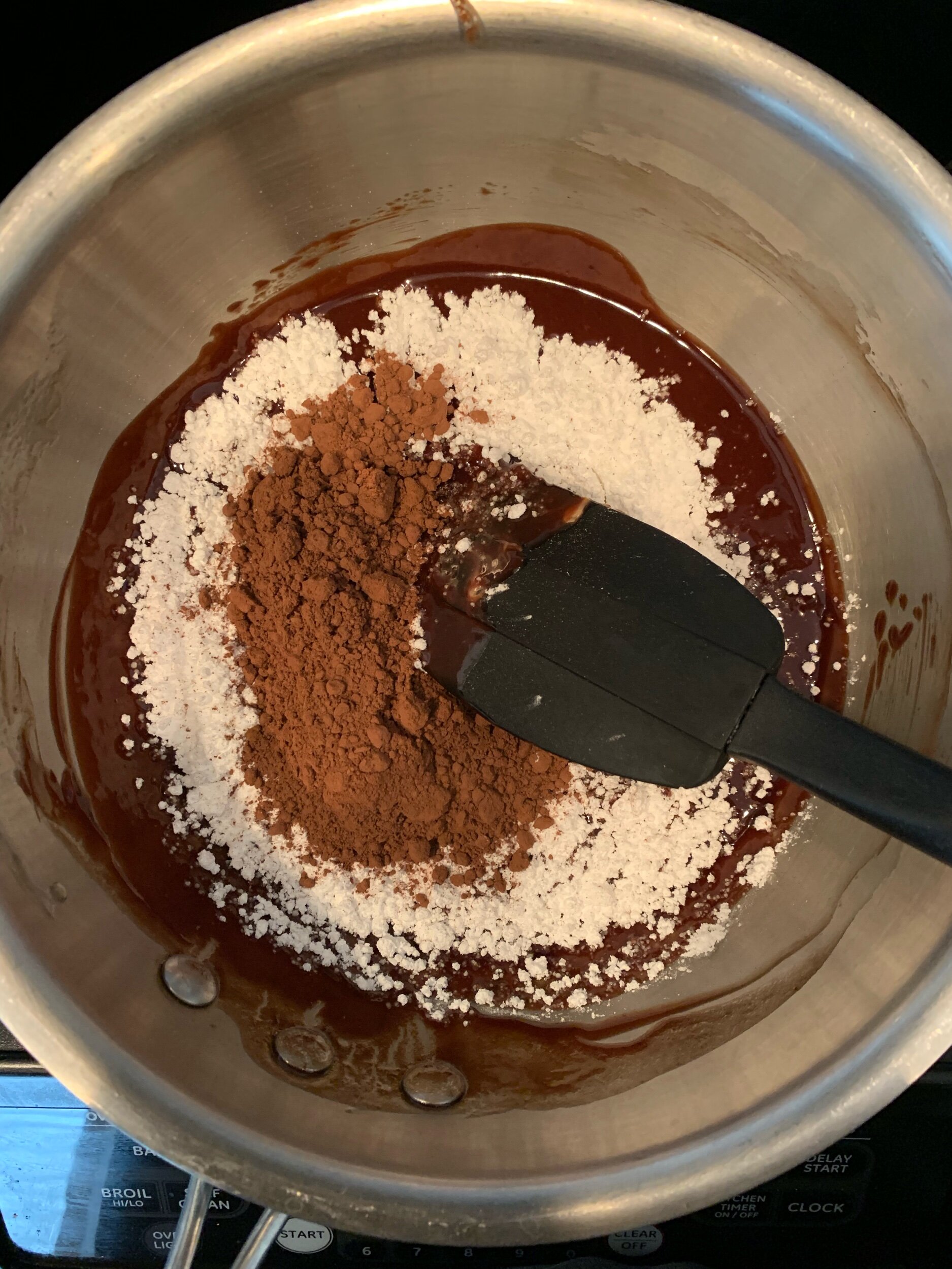 Chocolate filling combines powdered sugar, cocoa powder, semi-sweet chocolate and a dash of cinnamon.