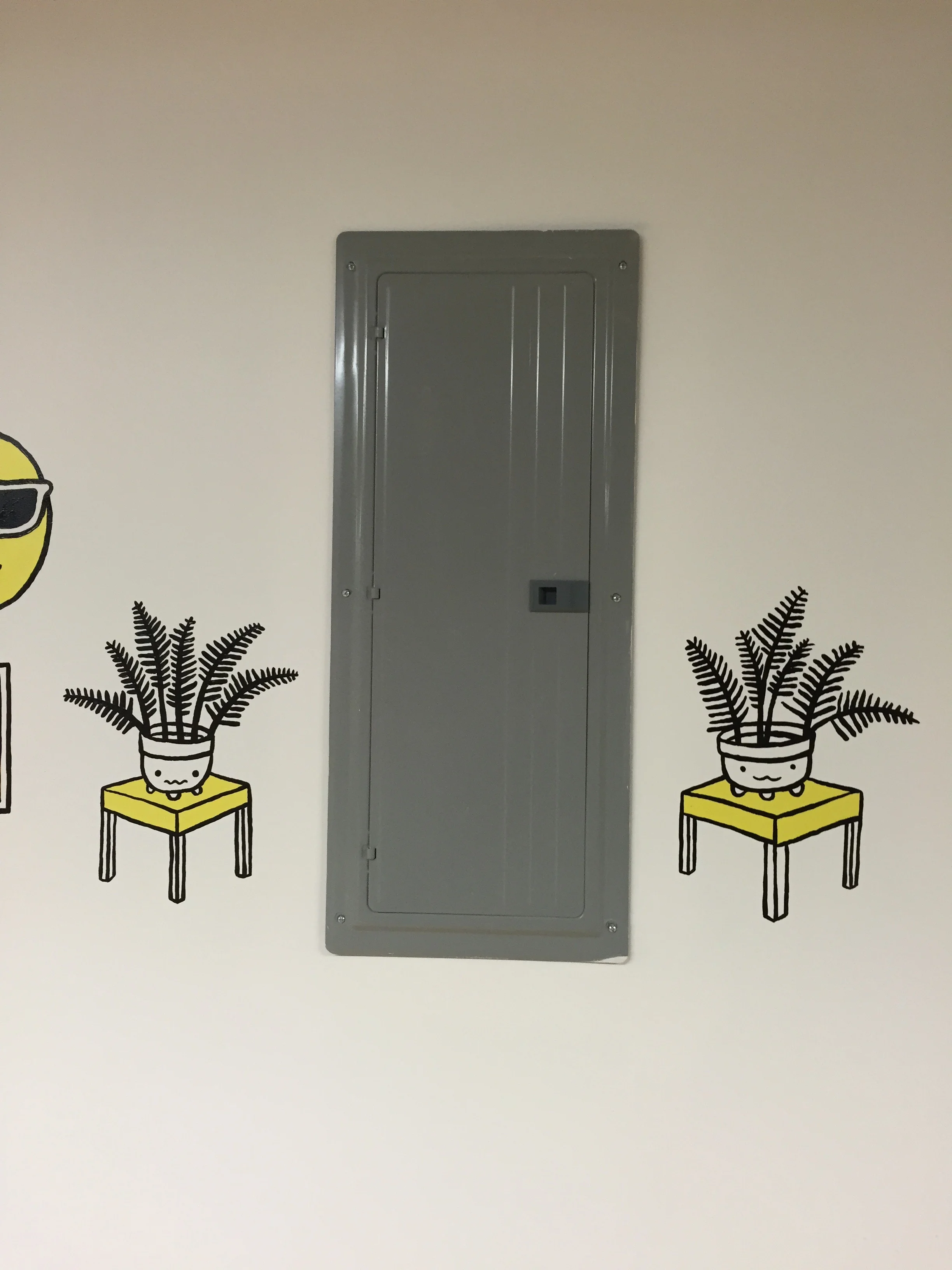 "Electrical boxes between two ferns"&nbsp; 