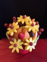 Ling Bouquet Cantaloupe, honeydew, grapes, strawberries and pineapple daises. This is a wonderful fresh fruit bouquet for any occasion, we can add dipped chocolate berries or leave plain. $52/$62/$72 Send Request