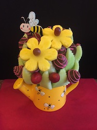 Bee Happy Large Honeydew melon, strawberries plain and milk chocolate with pink swirls and pineapple daisies $65 Send Request