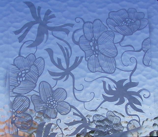 etched Flower design on textured glass 
