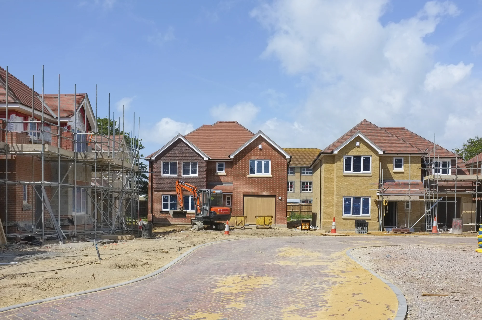 New homes under construction on a small site