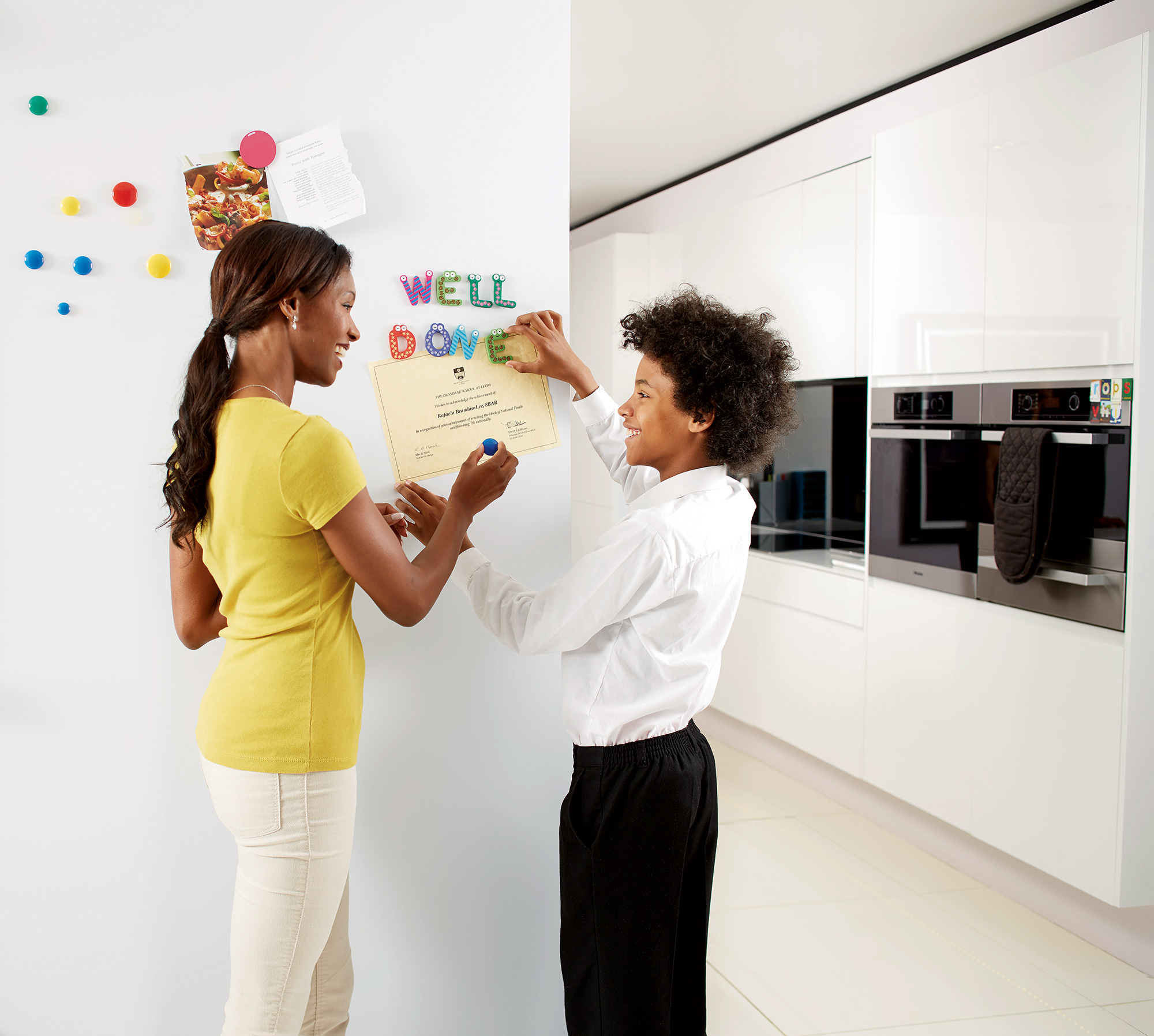 Mother and son in the kitchen