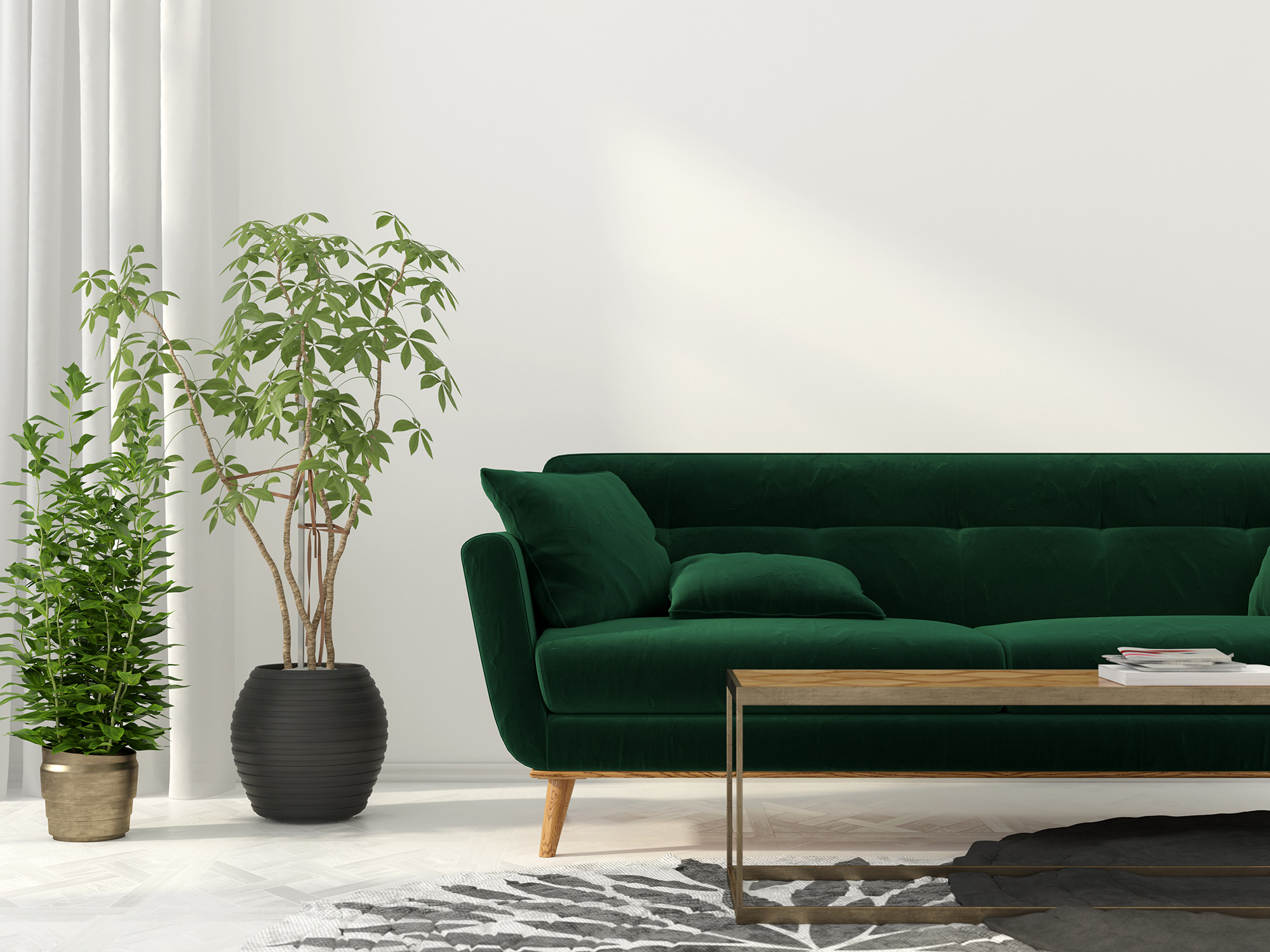 Light and airy lounge with green velvet sofa