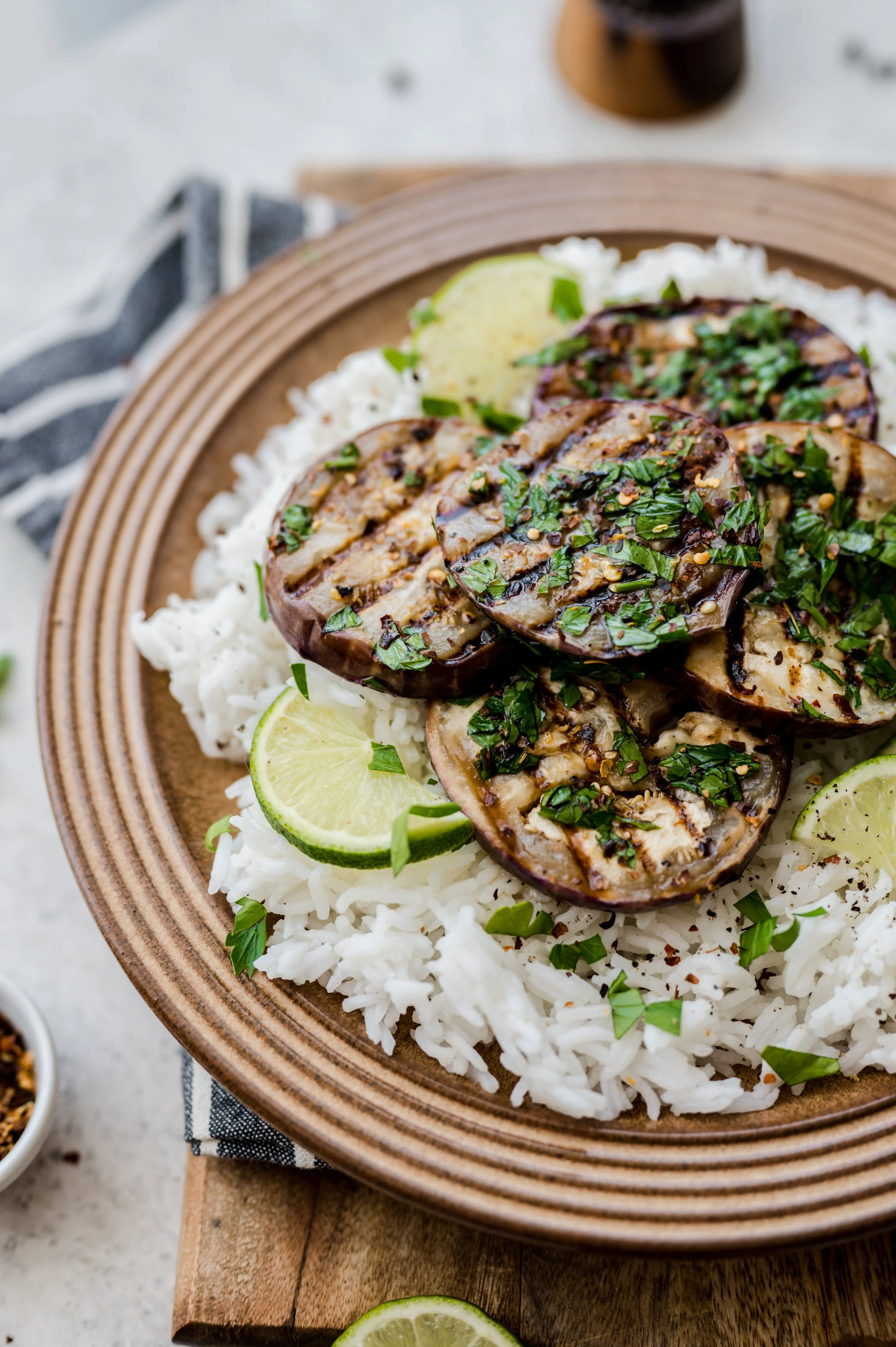 Grilled eggplant over rice with Black Garlic Sea Salt 