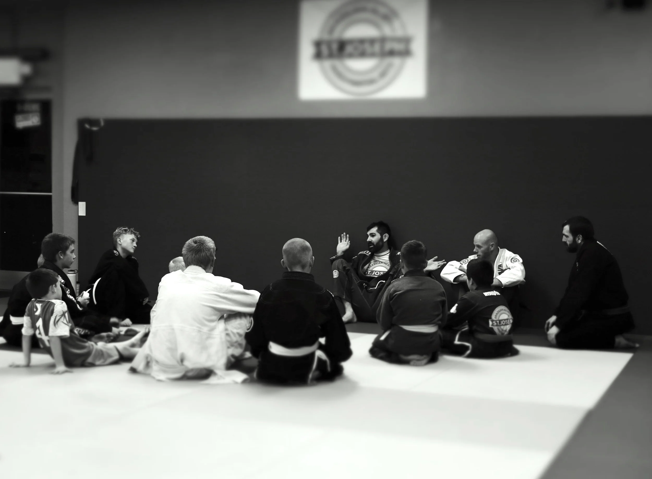 Having a discussion about it being ok to fail at things in Jiu Jitsu and life. If we continue giving our best effort everyday and trying the things we've learning in class, good things happen. Patience.