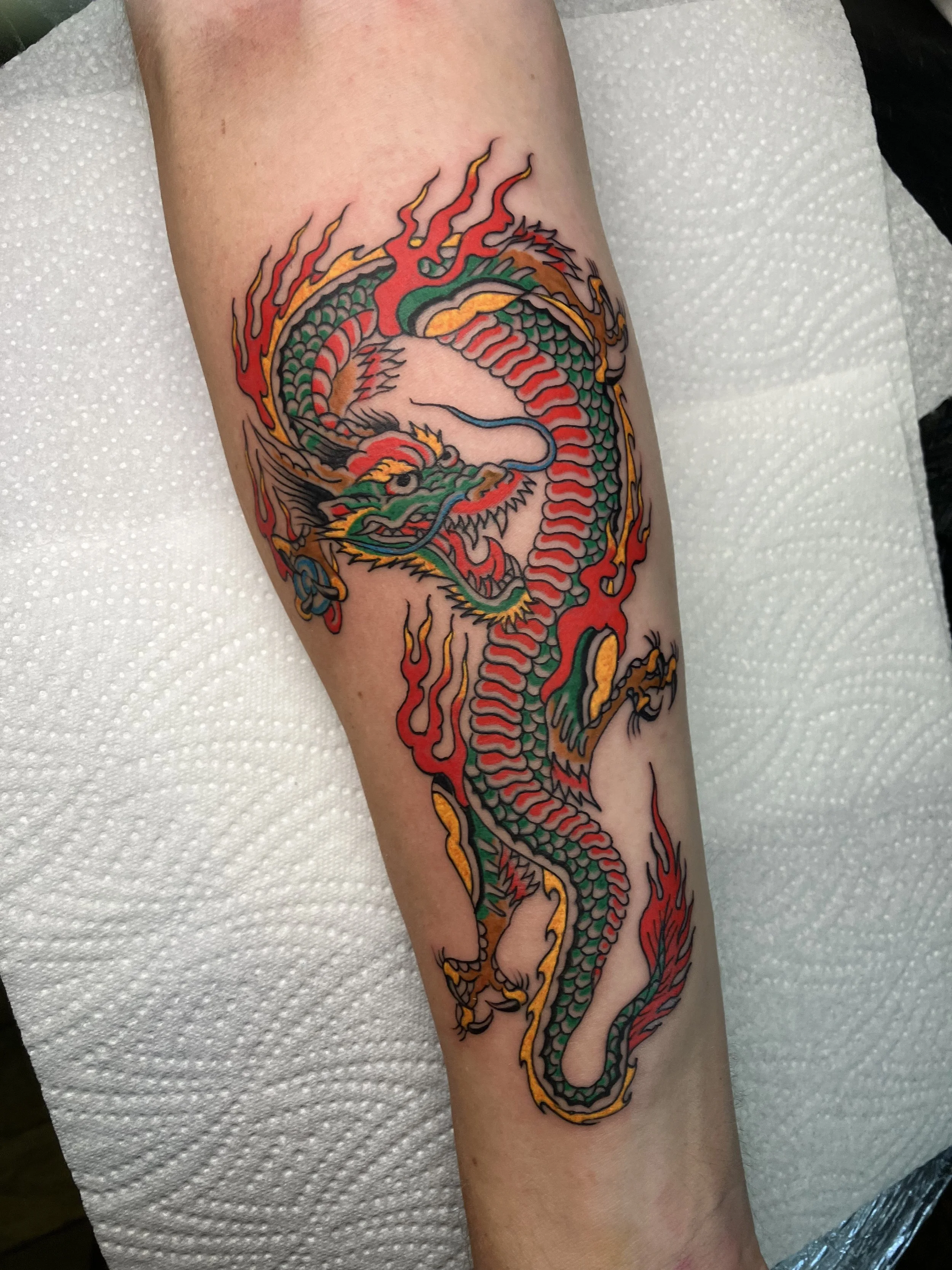 MikeMoneyz_TraditionalTattoo_ViennaElectricTattoo_dragon4.jpeg