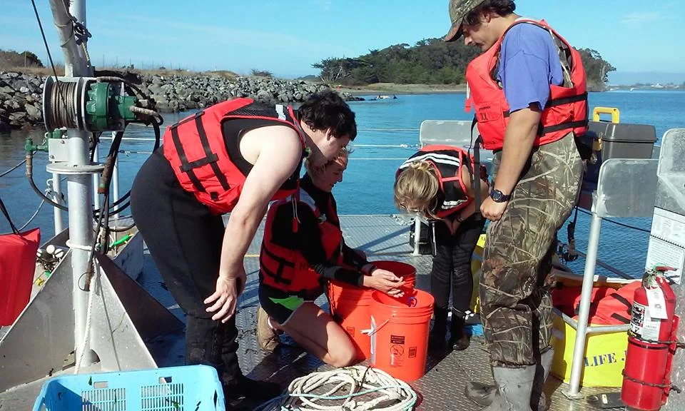 Students working on the Pontoon Boat during a course laboratory.