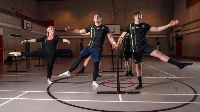 Donna Harrison teaches Patrick Casey, centre, and Oliver Partington, from Wigan Warriors’ youth team PAUL COOPER Image courtesy of thetimes.co.uk
